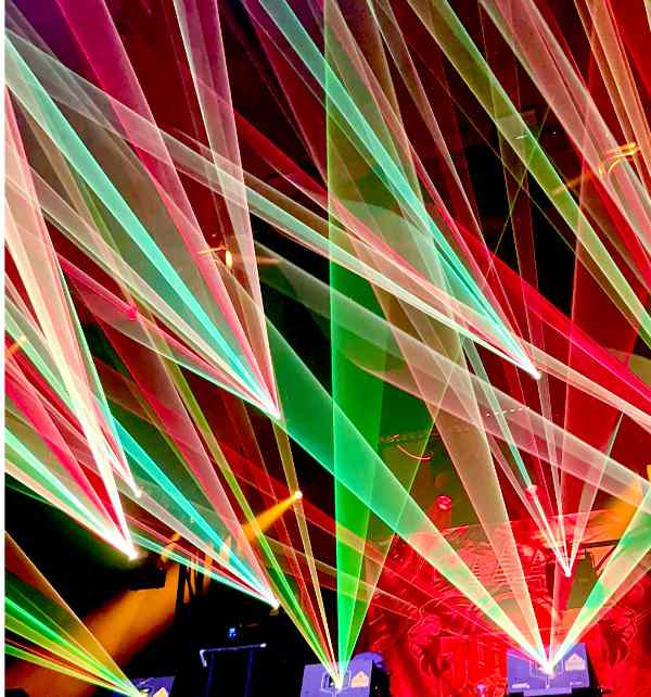 Colorful laser lights during a night performance