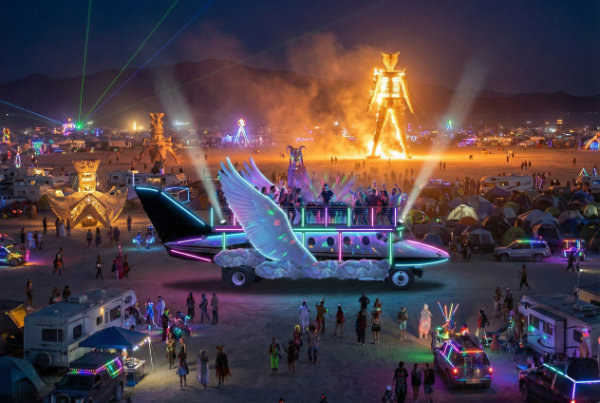 Litachok art car with fire in the Burning Man finale scene